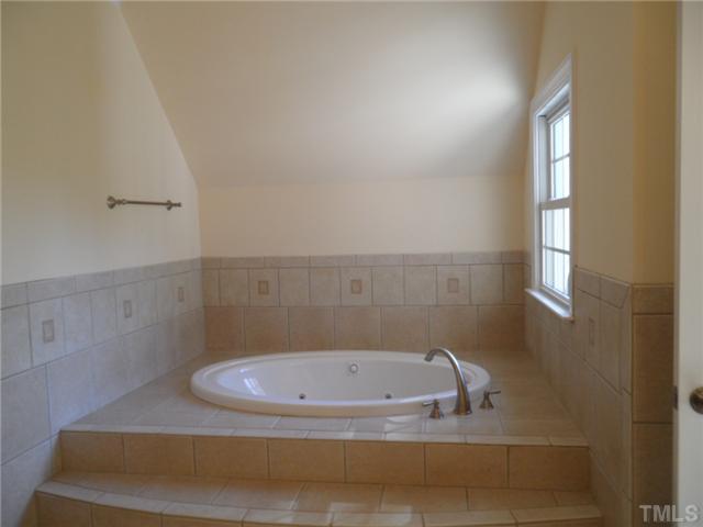 2037 Macon Ridge Road Raleigh, NC 27613 - Photo 23 of 25 a bathroom with a sink