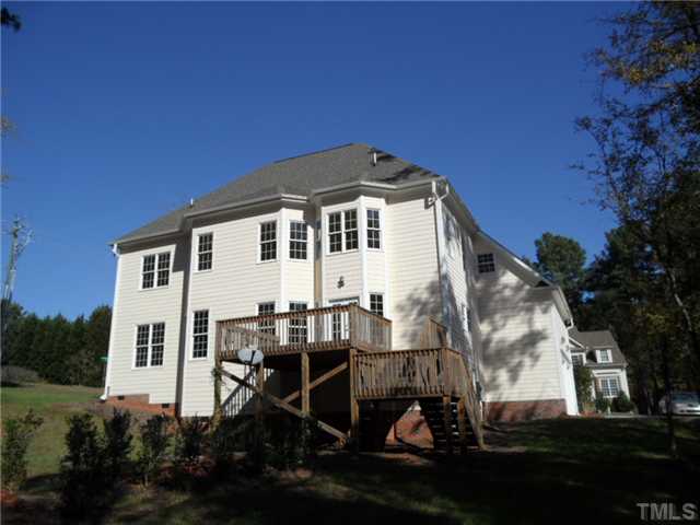 2037 Macon Ridge Road Raleigh, NC 27613 - Photo 3 of 25 a front view of a house with a yard
