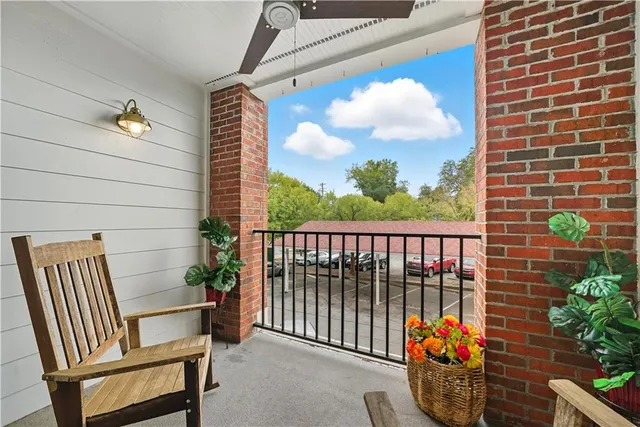 a bathroom with a shower and a sink