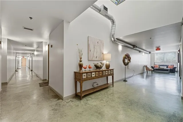 a patio with table and chairs