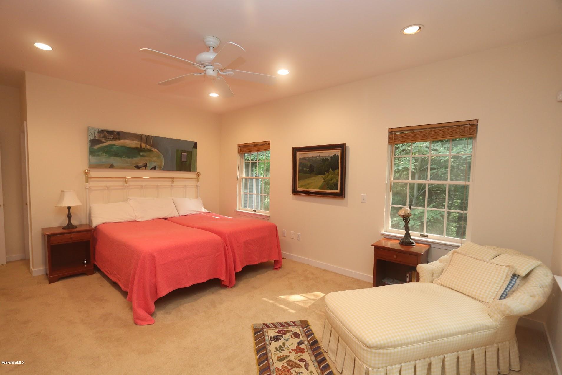 11 Prospect Hill Road, Unit 2 Stockbridge, MA 01262 - Photo 20 of 53 a bedroom with a bed a couch and dresser