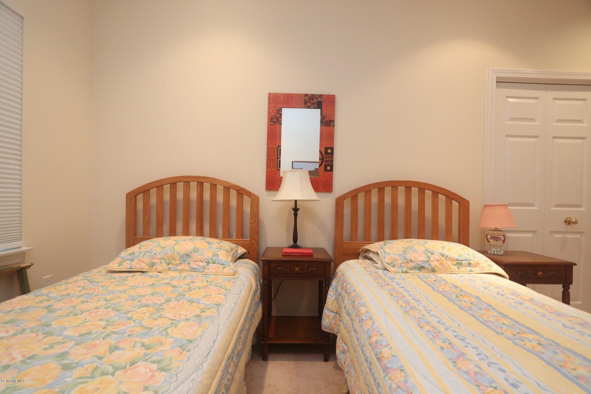 11 Prospect Hill Road, Unit 2 Stockbridge, MA 01262 - Photo 26 of 53 a bedroom with two beds and dresser