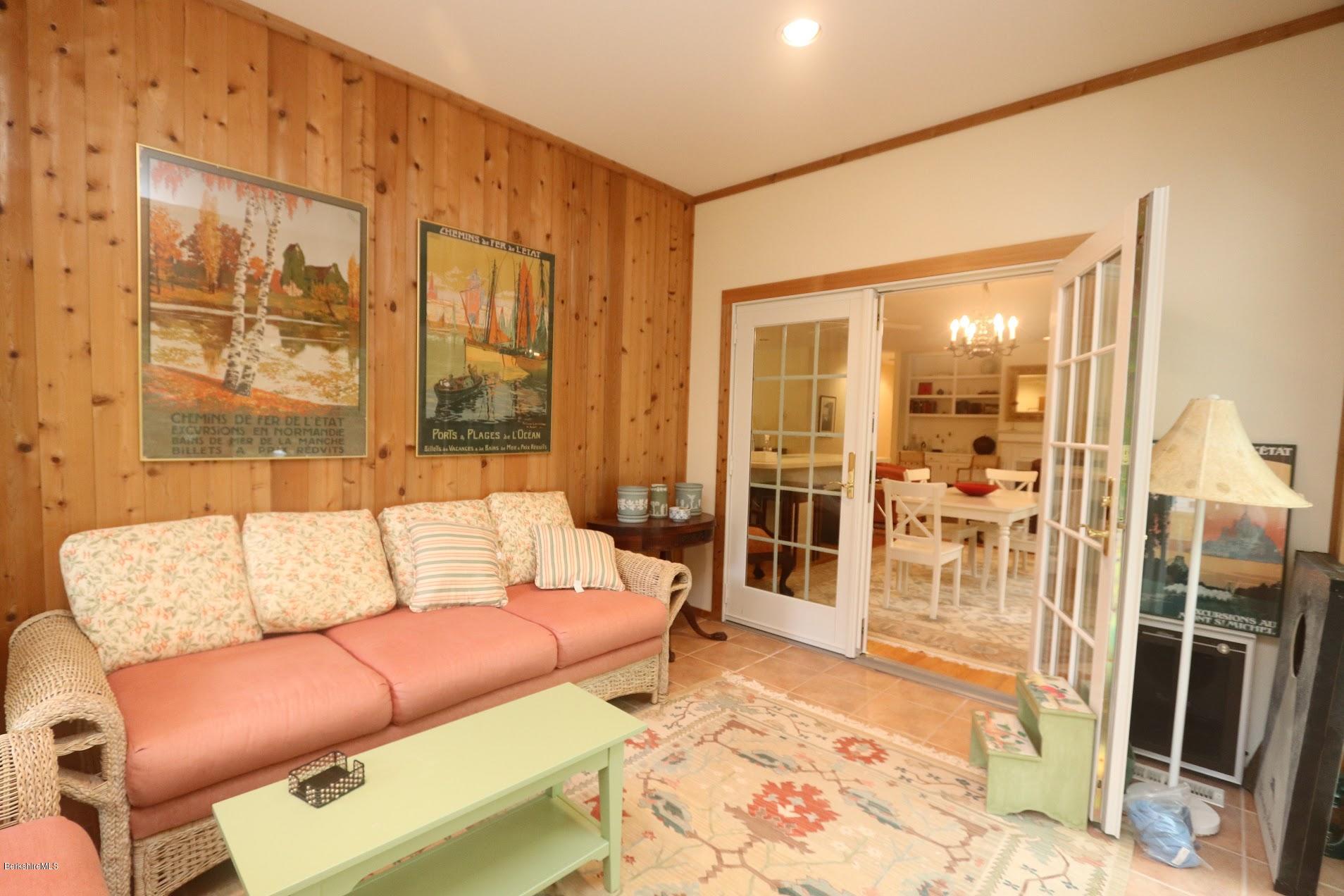 11 Prospect Hill Road, Unit 2 Stockbridge, MA 01262 - Photo 29 of 53 a living room with furniture and a rug