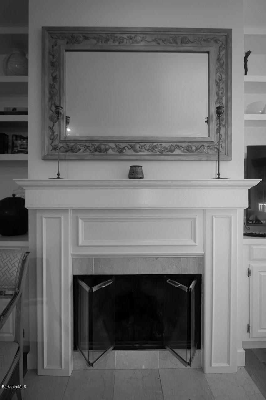 11 Prospect Hill Road, Unit 2 Stockbridge, MA 01262 - Photo 4 of 53 a bathroom with a fireplace and a vanity