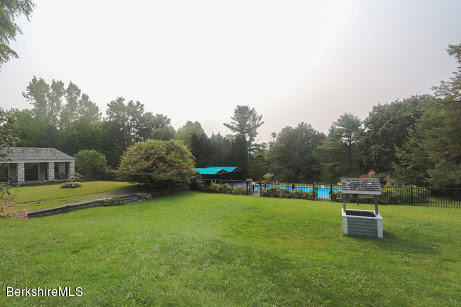 11 Prospect Hill Road, Unit 2 Stockbridge, MA 01262 - Photo 39 of 53 a view of a house with a yard porch and sitting area