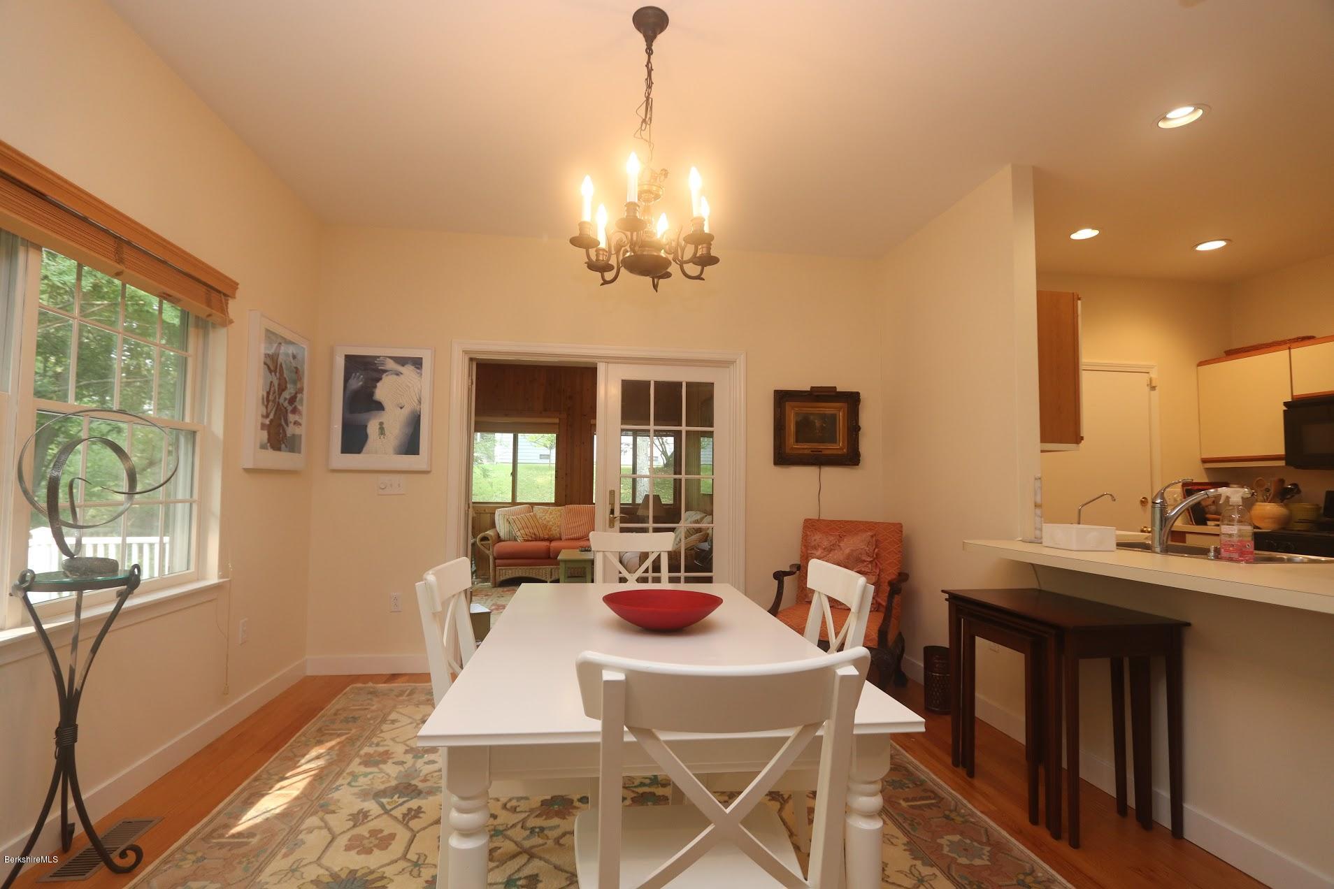 11 Prospect Hill Road, Unit 2 Stockbridge, MA 01262 - Photo 5 of 53 a view of a dining room with furniture window and wooden floor