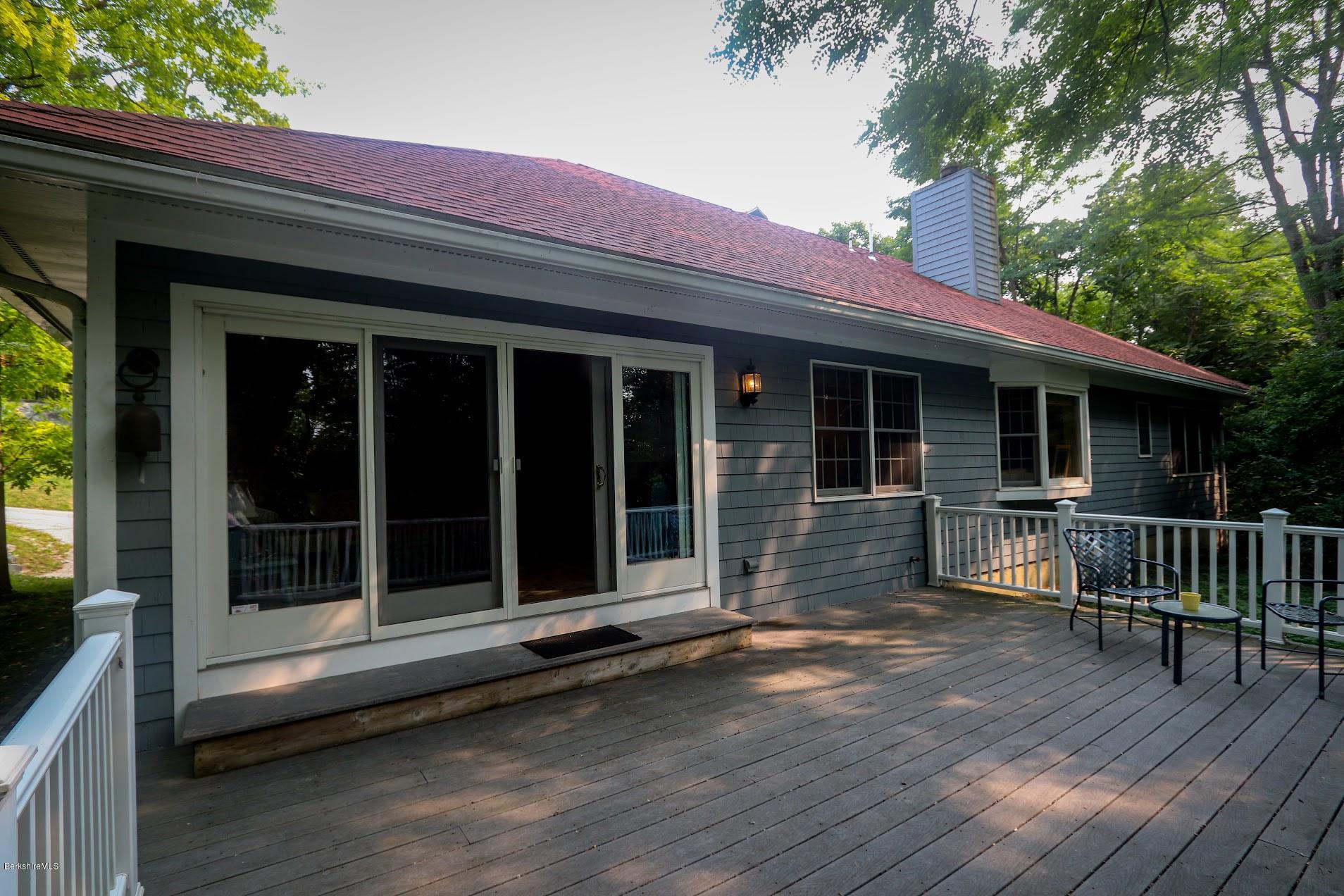 11 Prospect Hill Road, Unit 2 Stockbridge, MA 01262 - Photo 42 of 53 a view of house with large windows and wooden floor