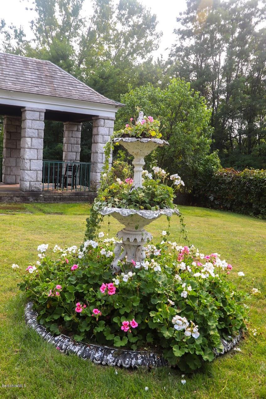 11 Prospect Hill Road, Unit 2 Stockbridge, MA 01262 - Photo 45 of 53 a view of a house with a swimming pool and garden