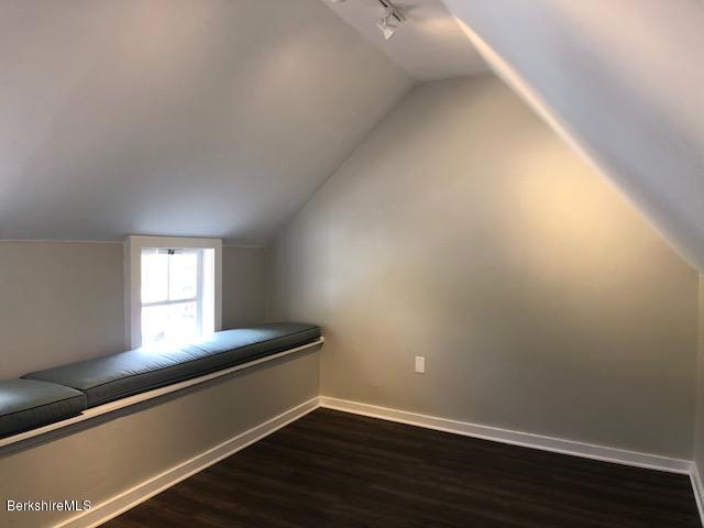 11 Prospect Hill Road, Unit 2 Stockbridge, MA 01262 - Photo 47 of 53 an empty room with wooden floor and windows