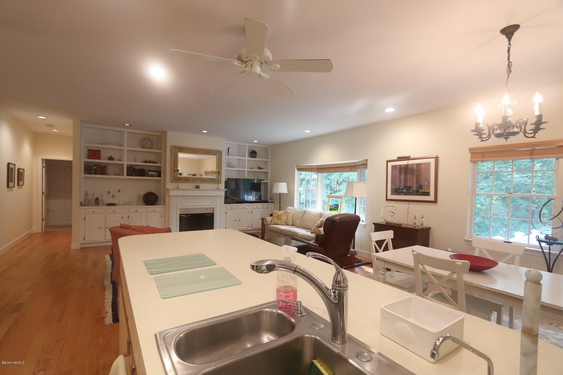 11 Prospect Hill Road, Unit 2 Stockbridge, MA 01262 - Photo 9 of 53 a living room with stainless steel appliances kitchen island granite countertop furniture and a view of kitchen