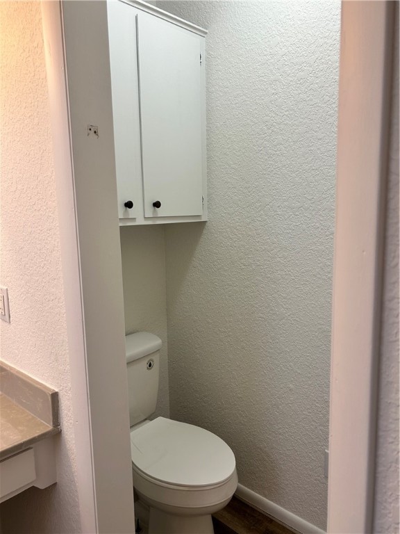 4042 Laguna Shores Road Corpus Christi, TX 78418 - Photo 20 of 25 a bathroom with a toilet