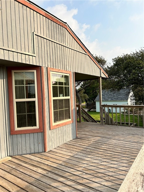 4042 Laguna Shores Road Corpus Christi, TX 78418 - Photo 21 of 25 a view of a house with wooden deck