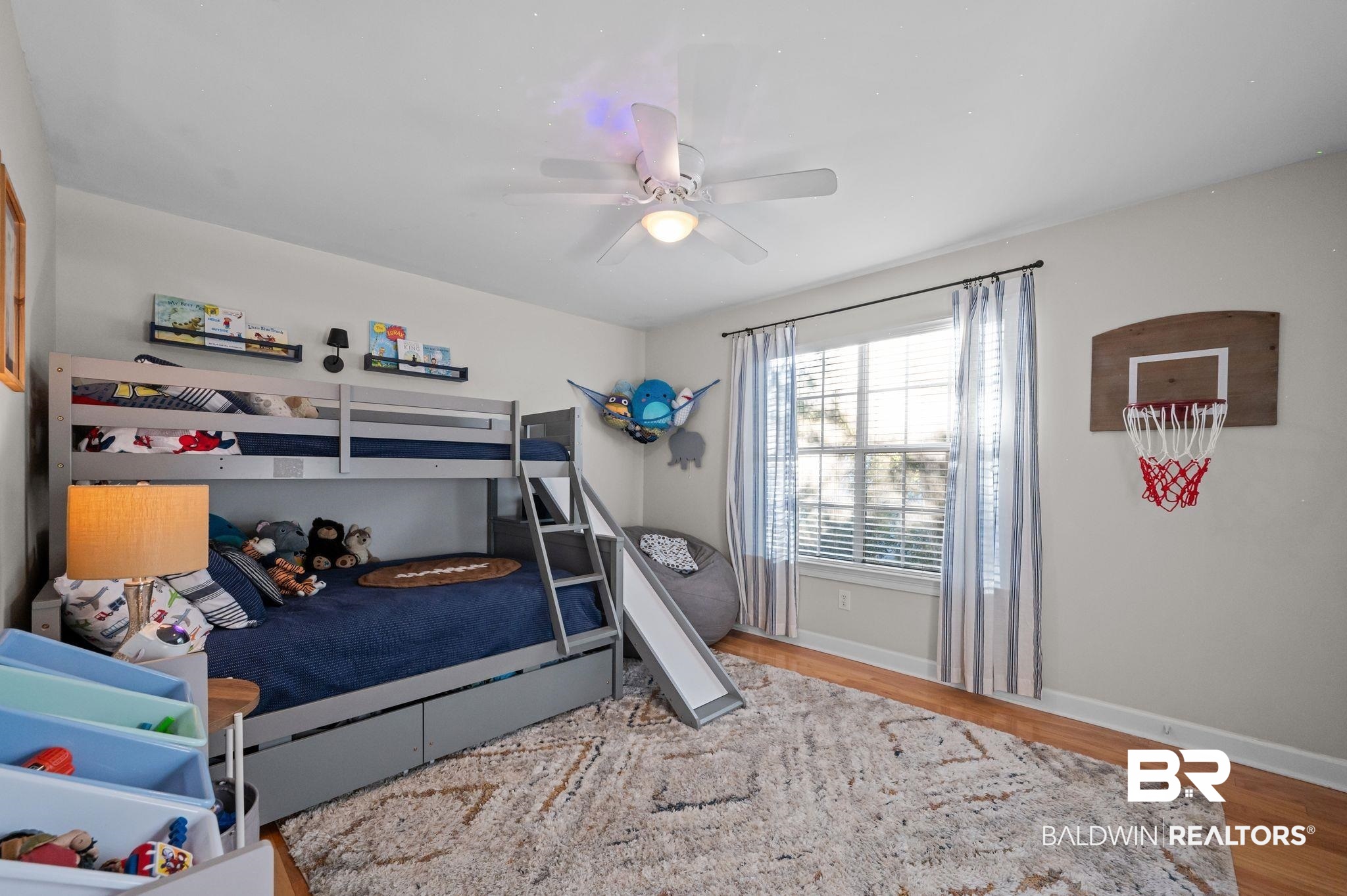 1825 Spring Hill Avenue Mobile, AL 36607 - Photo 24 of 43 Bedroom with ceiling fan and light wood-style floors