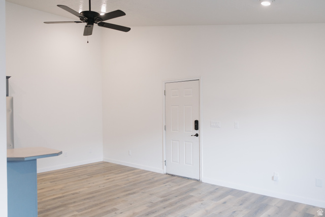 215 South 1050th West, Unit 10 Provo, UT 84601 - Photo 6 of 38 Unfurnished room with light wood-type flooring, a ceiling fan, and recessed lighting