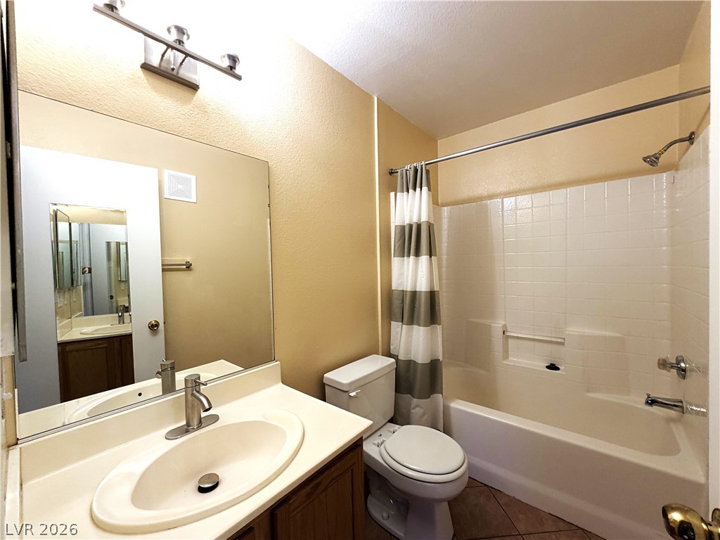 4955 South Lindell Road, Unit 203 Las Vegas, NV 89118 - Photo 19 of 31 A well-maintained full bathroom offers functional design and practical comforts.