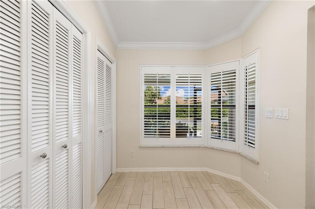 3346 Erick Lake Drive, Unit 2001 Naples, FL 34109 - Photo 12 of 43 a view of a room with windows
