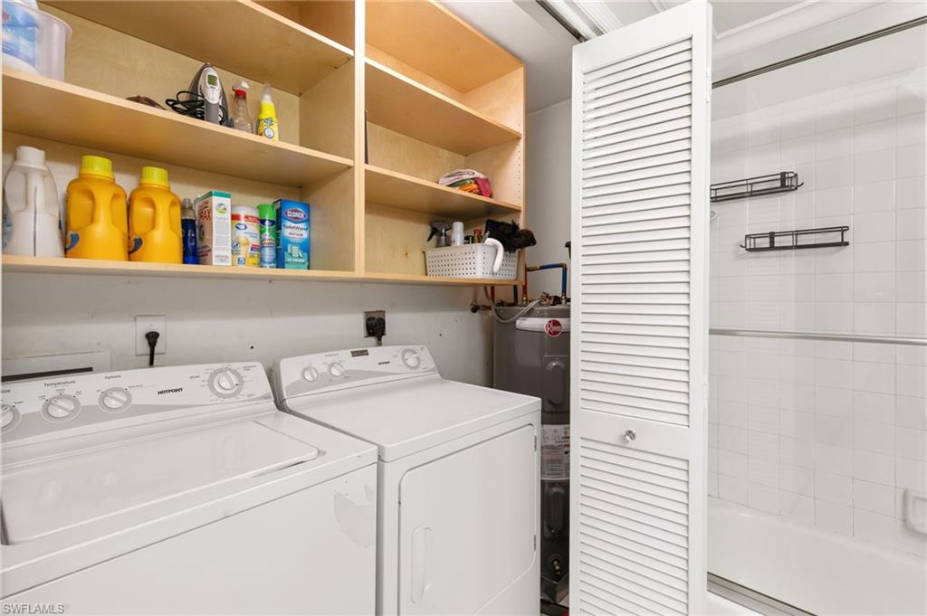 3346 Erick Lake Drive, Unit 2001 Naples, FL 34109 - Photo 23 of 43 a utility room with dryer and washer