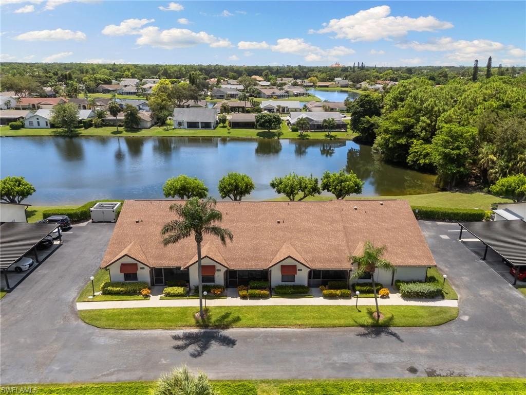 3346 Erick Lake Drive, Unit 2001 Naples, FL 34109 - Photo 37 of 43 an aerial view of a house with a swimming pool yard and outdoor seating