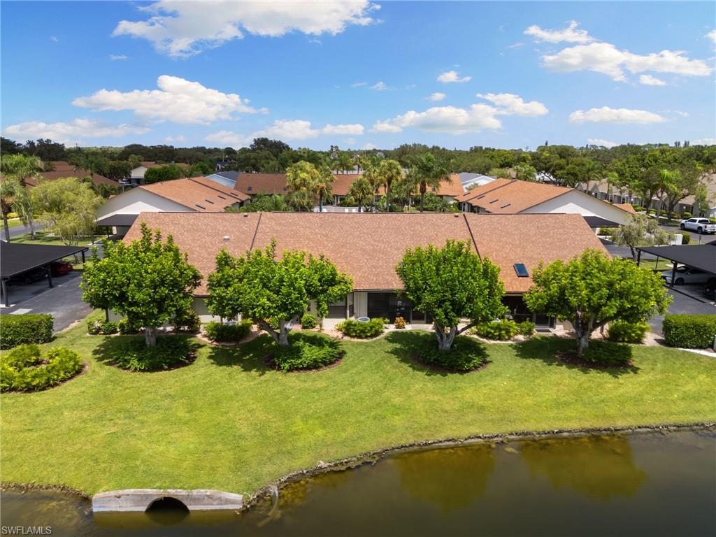 3346 Erick Lake Drive, Unit 2001 Naples, FL 34109 - Photo 43 of 43 a view of a lake with a mountain