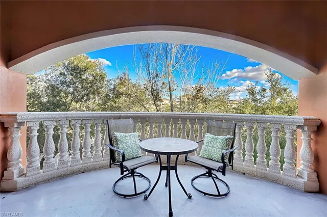 a view of a two chairs in the roof deck