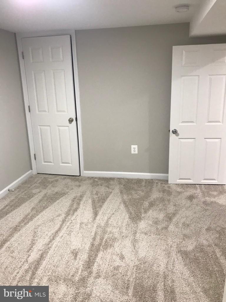 418 Cedar Hill Road Baltimore, MD 21225 - Photo 6 of 18 Basement bedroom