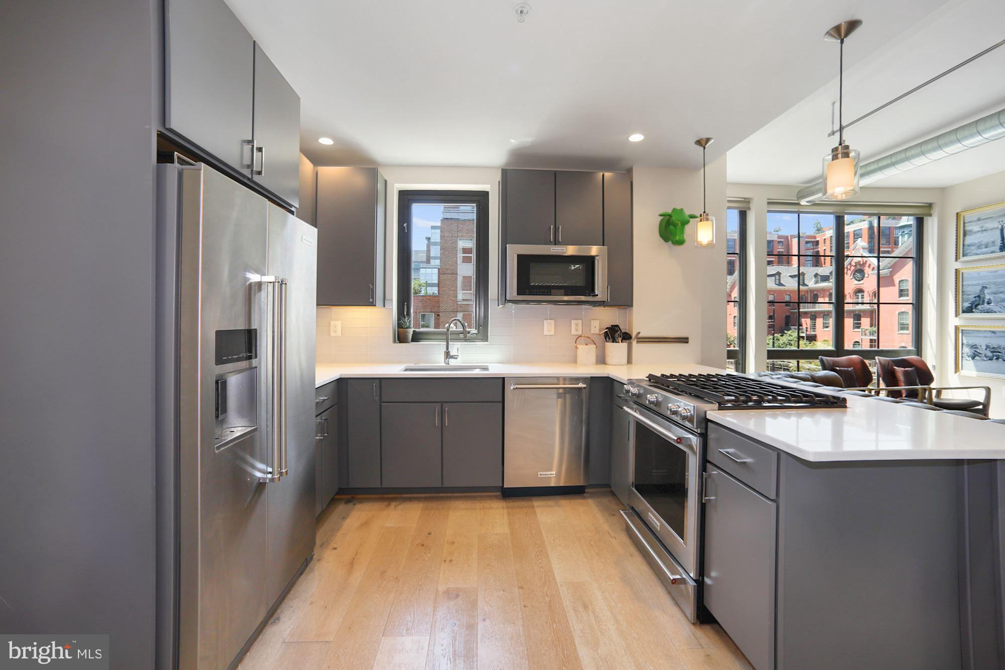 301 H Street Northeast, Unit 305 Washington, DC 20002 - Photo 6 of 31 Gourmet kitchen
(previous photo)