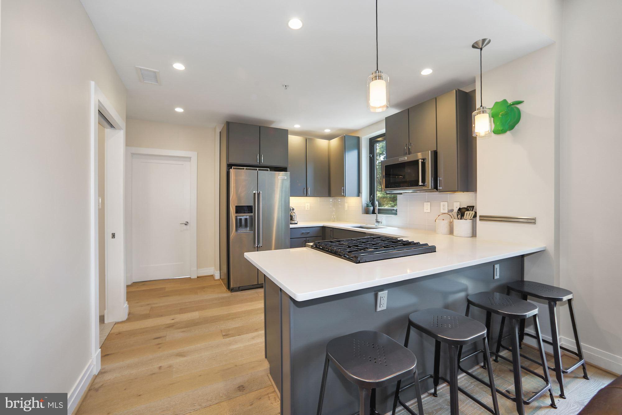 301 H Street Northeast, Unit 305 Washington, DC 20002 - Photo 7 of 31 4 bar stools remains with rental
(previous photo)
