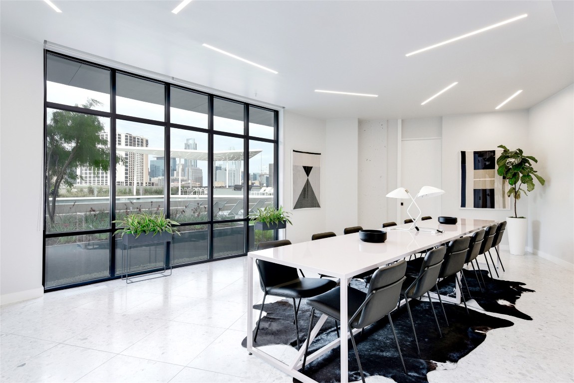 800 Embassy Drive, Unit 609 Austin, TX 78702 - Photo 29 of 33 a view of a dining room with furniture window and outside view