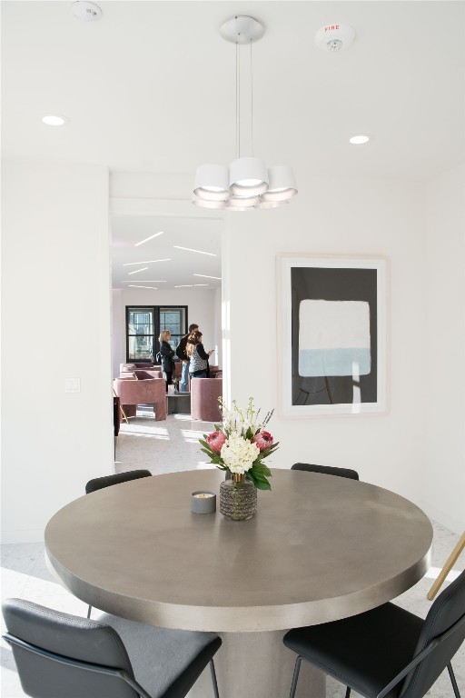 800 Embassy Drive, Unit 609 Austin, TX 78702 - Photo 31 of 33 a dining room with table and chairs
