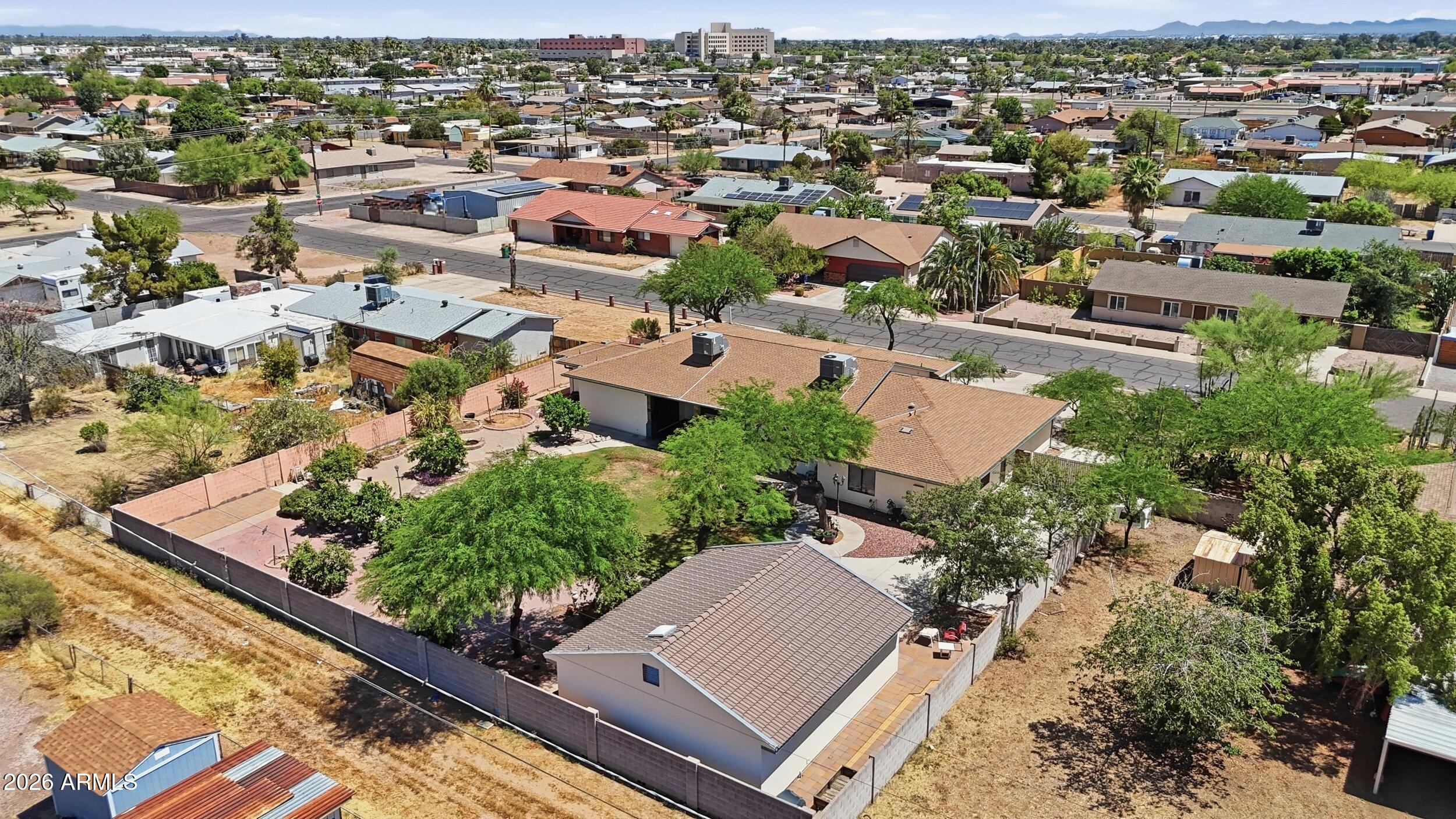 6334 East Albany Street Mesa, AZ 85205 - Photo 62 of 72 an aerial view of residential houses with outdoor space