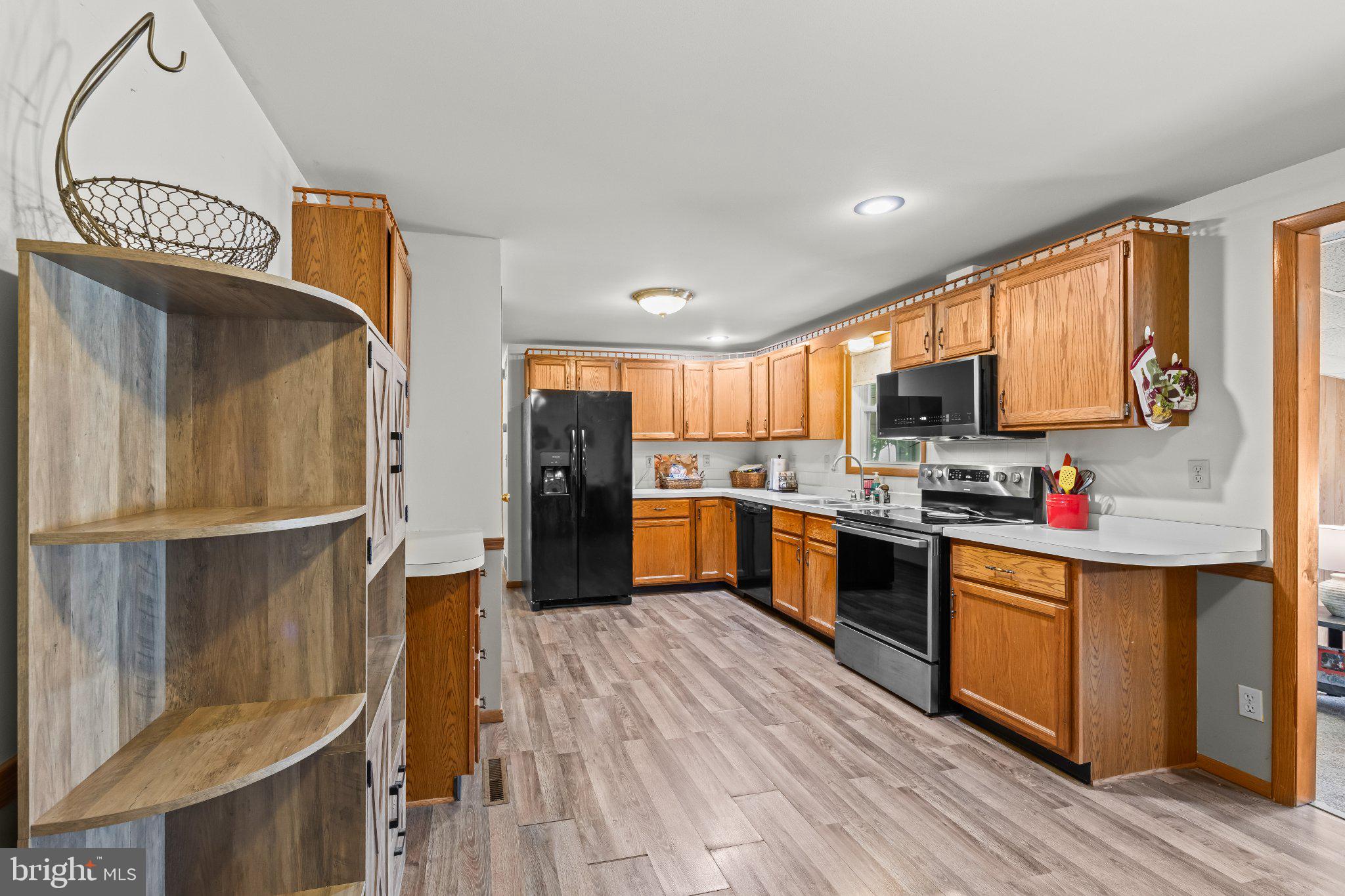 9 Raspberry Drive Mechanicsburg, PA 17050 - Photo 11 of 30 Modern kitchen with warm wood tones.