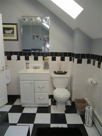 150 Dover Street Fall River, MA 02721 - Photo 13 of 30 a bathroom with a sink toilet and a mirror