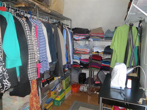 150 Dover Street Fall River, MA 02721 - Photo 17 of 30 a view of walk in closet with clothes and shoes