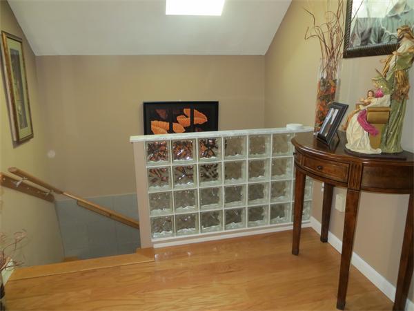 150 Dover Street Fall River, MA 02721 - Photo 18 of 30 a view of a room with wooden floor and windows