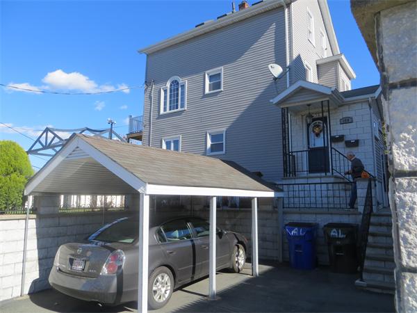 150 Dover Street Fall River, MA 02721 - Photo 27 of 30 a front view of a house with a space balcony
