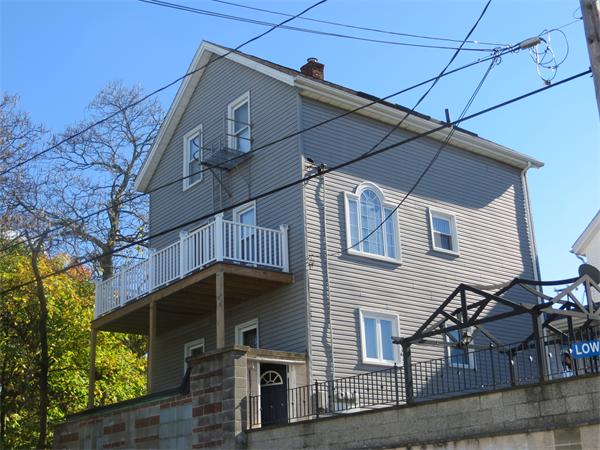 150 Dover Street Fall River, MA 02721 - Photo 28 of 30 a front view of a house with garage
