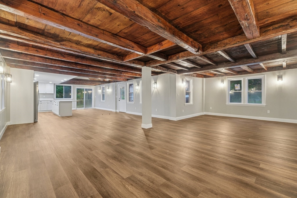 1 Rounseville Road Rochester, MA 02770 - Photo 13 of 42 a view of an empty room with wooden floor