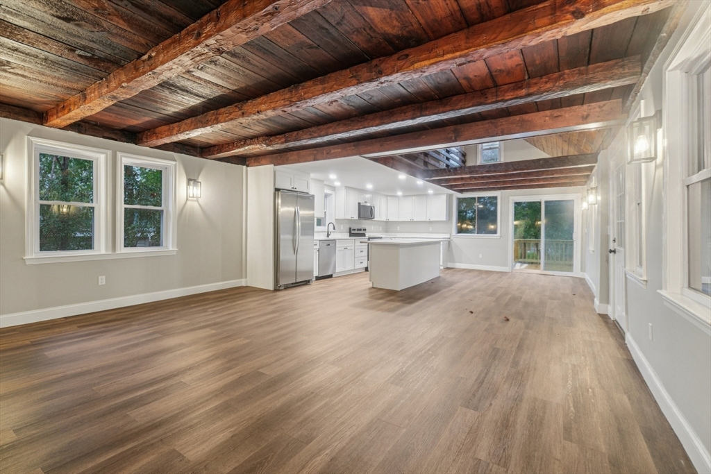 1 Rounseville Road Rochester, MA 02770 - Photo 16 of 42 a view of empty room with wooden floor and fan