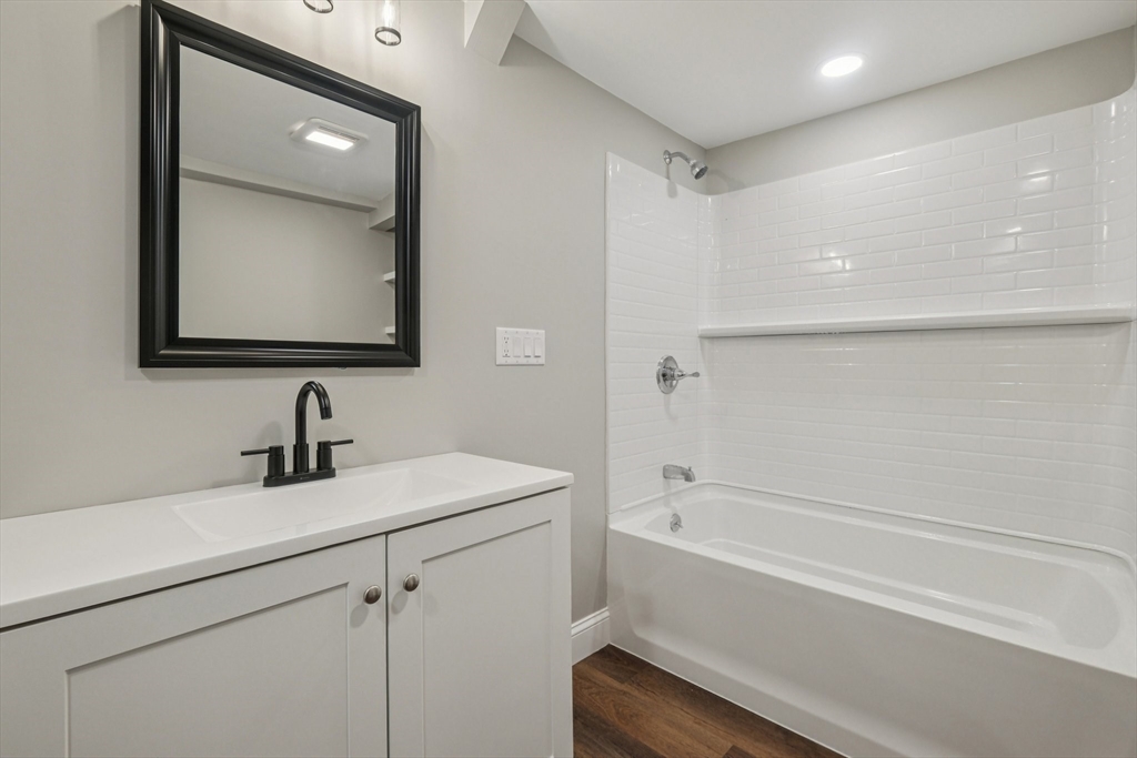 1 Rounseville Road Rochester, MA 02770 - Photo 26 of 42 a bathroom with a sink and a mirror