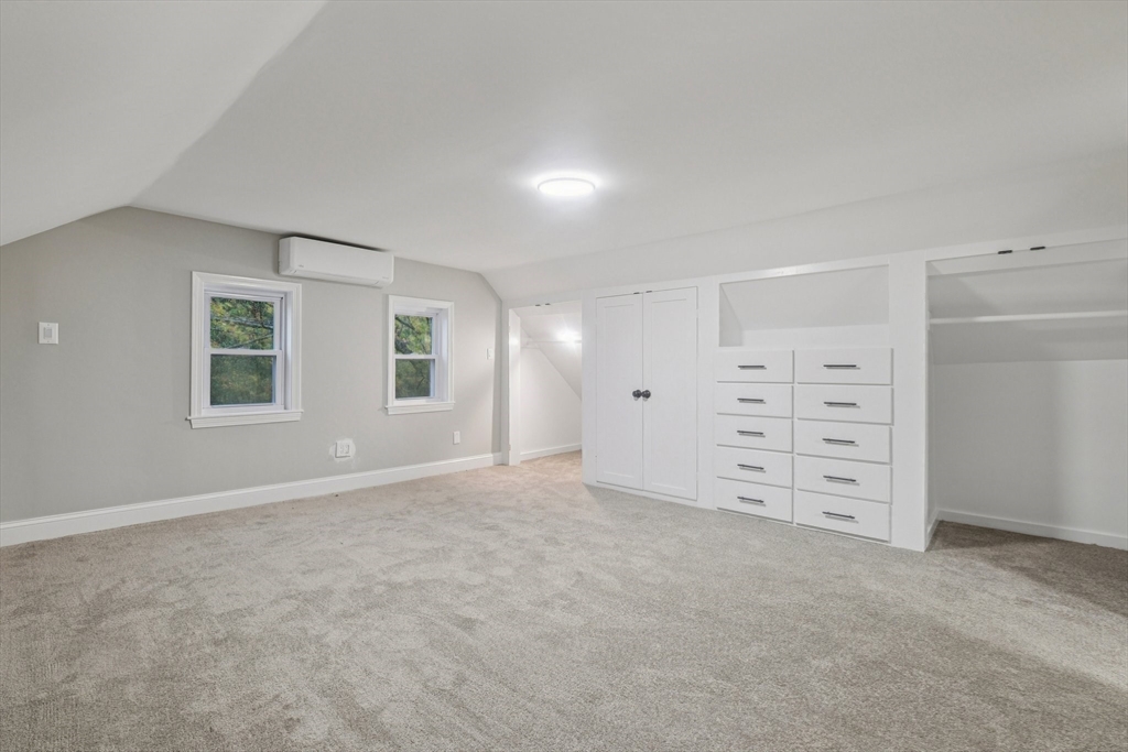 1 Rounseville Road Rochester, MA 02770 - Photo 33 of 42 wooden view of an empty room with cabinet and stairs