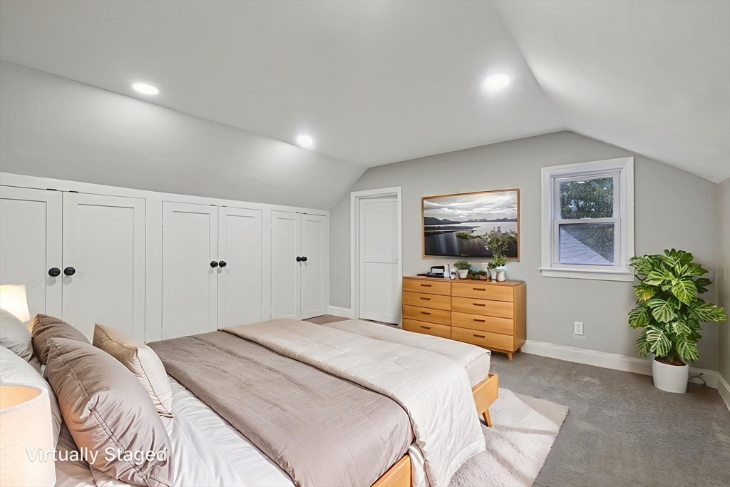 1 Rounseville Road Rochester, MA 02770 - Photo 5 of 42 a bedroom with a bed and a potted plant