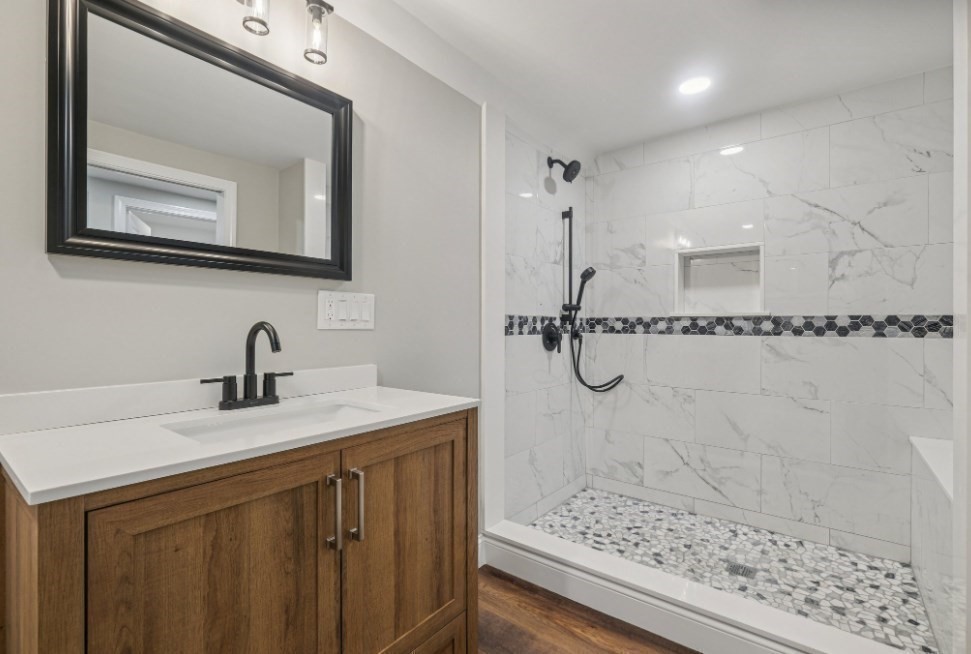 1 Rounseville Road Rochester, MA 02770 - Photo 6 of 42 a bathroom with a granite countertop sink a mirror and shower