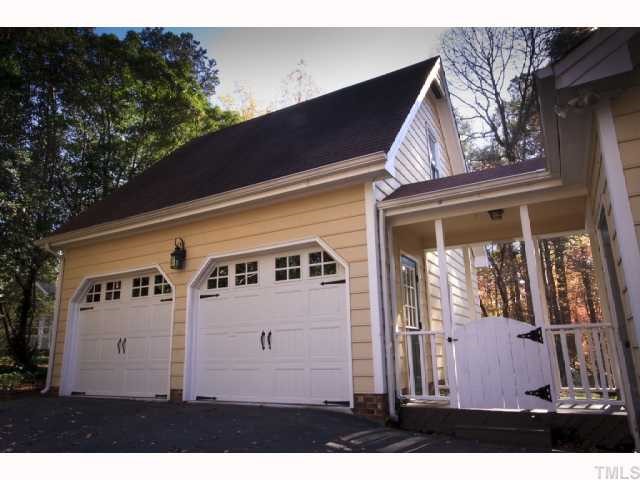 8305 Morgans Way Raleigh, NC 27613 - Photo 11 of 12 a front view of a house with a yard