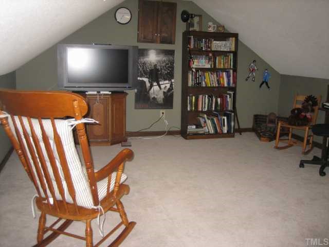 8305 Morgans Way Raleigh, NC 27613 - Photo 9 of 12 a view of furniture and in a room