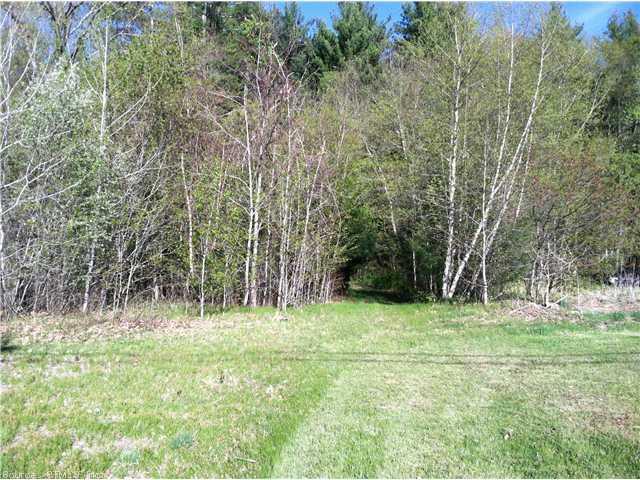 298 North Windham Road Windham, CT 06256 - Photo 1 of 1 a backyard of a house with lots of green space and chair