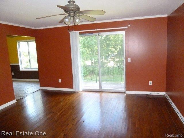 505 West Highland Road, Unit 27 Howell, MI 48843 - Photo 9 of 21 261-854461 Living Room.jpg