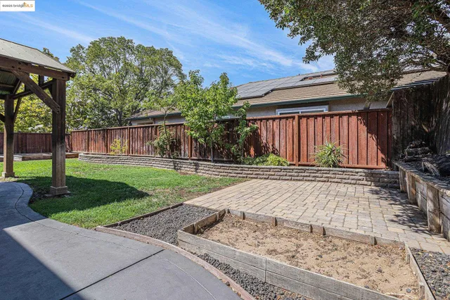 a view of a backyard with a garden