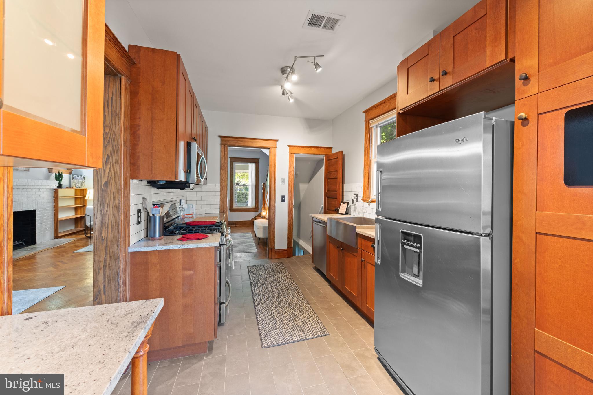 4110 4th Street Northwest Washington, DC 20011 - Photo 21 of 46 a kitchen with stainless steel appliances granite countertop a refrigerator and a sink