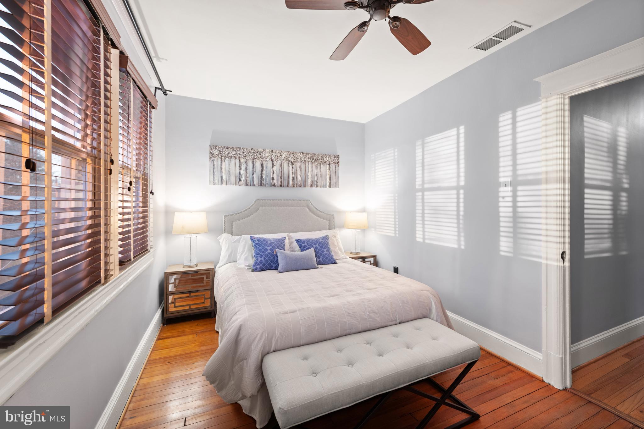 4110 4th Street Northwest Washington, DC 20011 - Photo 36 of 46 a bedroom with a bed and wooden floor