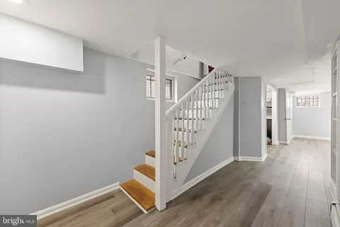 a view of entryway with wooden floor